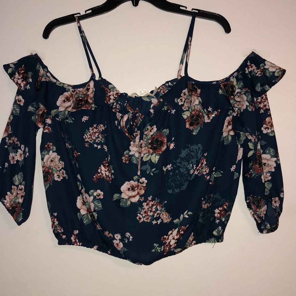 Floral blouse off the shoulders